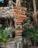 wooden beach sign in koh tao, thailand